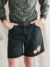 Load image into Gallery viewer, 1990s Levi&#39;s Patched Black Denim Shorts Size 31&quot;
