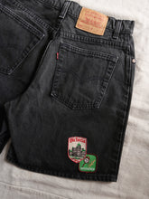 Load image into Gallery viewer, 1990s Levi&#39;s Patched Black Denim Shorts Size 31&quot;
